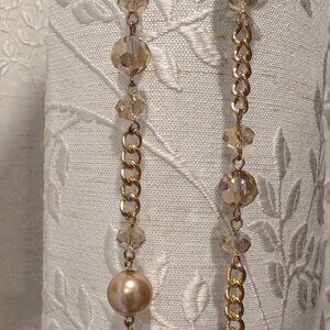 57" gold tone chain with faux pearls and crystals
